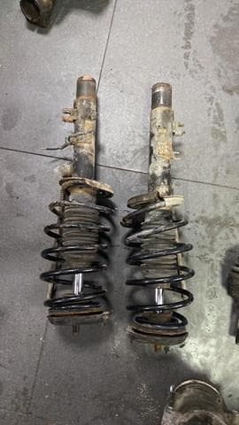 Пружина передняя