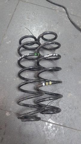 Пружина задняя